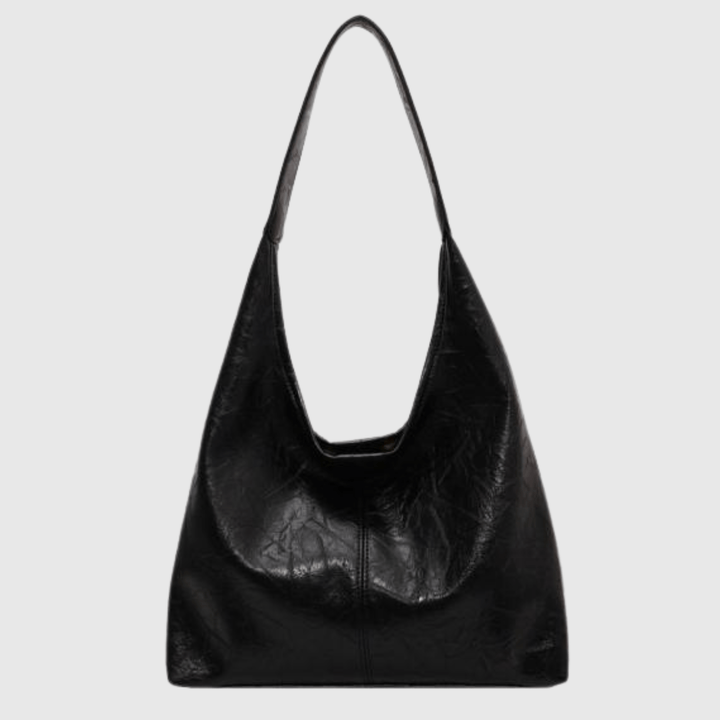 https://cdn.shopify.com/s/files/1/0806/5564/7050/files/muller-mode-ylona-umhangetasche-vintage-eleganz-schultertaschen-710974.png?v=1736680196